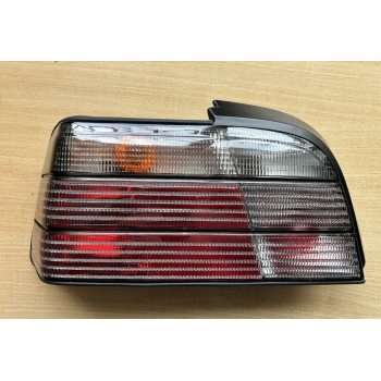 BMW e36 Coupe/Cabrio (92-99) tonēts, aizmugures L lukturis, AR DEFEKTU